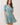 Striped Flattering V Slit Neck Bubble Sleeve Dress worn by model featuring a tiered ruffle skirt and smocked waist.
