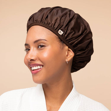 Kitsch Shower Cap 2pc Set worn by woman with brown shower cap