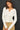 Front view of model wearing purple [NEW COLOR] Ribbed Crewneck Cardigan in white