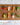 Felt Keychain - Smiley Veggies collection showcasing colorful and cute veggie keychains on a woven mat.