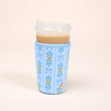 Sip Savvy Drink Sleeve Large Oh So Fancy Blue with floral design, perfect for holding cold beverages.