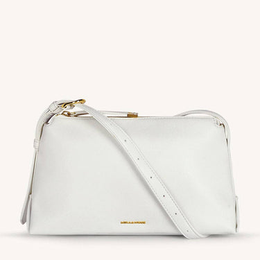 Mira & Moss Audrey Crossbody Bag in white vegan leather with gold-tone hardware and an adjustable strap.