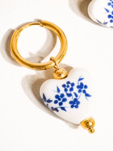 18K gold non-tarnish ceramic floral heart earrings close-up