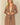 Shop Wall open front cardigan in brown with long sleeves and side pockets worn by a blonde model
