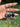 Blue Goldstone Crystal Keychain featuring polished deep blue sparkling gemstones displayed in a hand