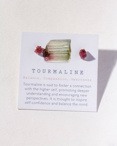 Pure Earth Gemstone Post Earring- Tourmaline displayed with information on its properties and benefits.