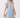 Shop Wall printed mini dress with blue floral pattern, notch neckline, and flutter sleeves on a blonde model