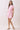 Floral Print Elastic Waist A Line Mini Dress worn by model in pink floral pattern with collared neckline and side pockets.