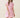 Model wearing a Shop Wall pink floral print woven mini dress with a collared neckline and elasticized waist.