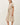 Shop Wall striped linen blend midi dress with collar, button-up front, patch pockets, and waist tie on a model