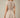 Back view of a model wearing a Shop Wall beige and white striped mini dress with short sleeves and a smocked waist.